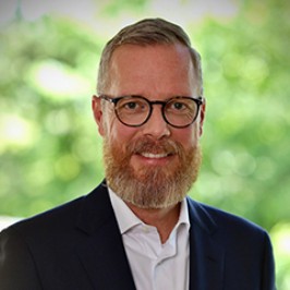 Portrait photo of Christoph Dedio, member of the management team at AirPlus.
