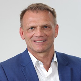 Portrait photo of Eric Zymna, member of the management team at AirPlus.