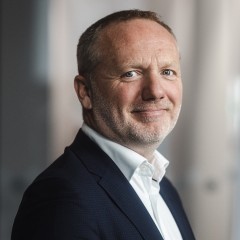 Portrait photo of Mads Krumhardt Enggren, member of the management team at AirPlus.
