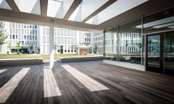 Terrace and garden area of the AirPlus headquarters, providing employees a relaxing outdoor space.